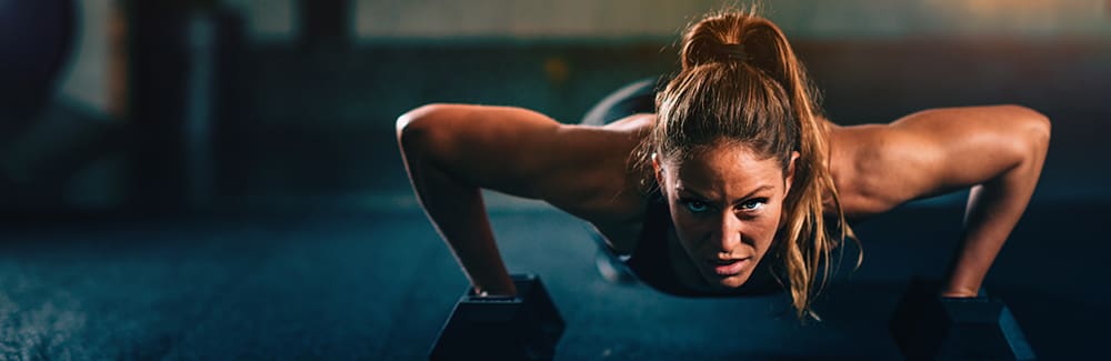 Woman working out in personal fitness.